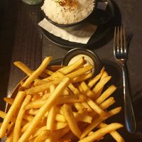 Fries with truffle sauce (must try) at Ladybird Restaurant & Bar in Main Beach