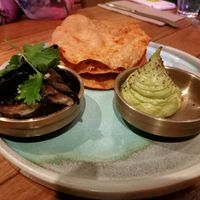 Tostadas with guacamole and roasted eggplant at Mama Taco in West End