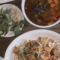 spicy vegan lemongrass soup on top // stir fried garlic noodles and tofu on bottom  at Z Asian - Vietnamese Kitchen in Orlando