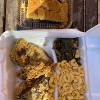 Fried chick’n meal with collards, mac & cheese, and cornbread  at Our Vegan Corner in Syracuse