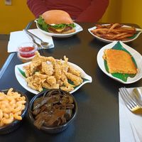 Chick'n meal and home style burger with fries. at Our Vegan Corner in Syracuse