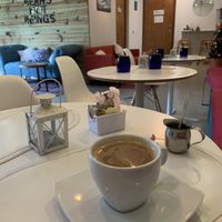 Coffee with oat milk   at Origin Cafe in Noord