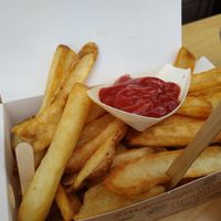 Fries (big portion) with ketchup in a take-out box. at Vegánsky Gazda in Trencin
