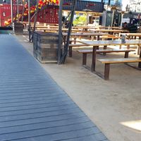 Outdoor seating. Get beer, video games, other food options at Duck Donuts in Garden Grove