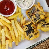 To fish and chips. They forgot the salad at Slam Dunk Sandwich Co in Siem Reap