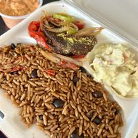Soy burger, potato salad, rice and beans with a side of cashew cream sauce.  at Natural Plaza in Jarabacoa