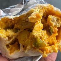 Up close of buffalo breakfast burrito (made with tofu)   at Minglewood Bake Shop in Richmond