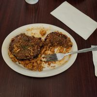 Crabcakes over Mac and cheese at KraVegan in Jacksonville