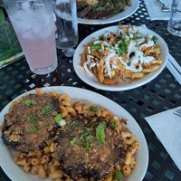 Signature Krab (Hearts of Palm, Artichoke Bottoms, Mushrooms) 
over infamous Mac N'Cheeze

 and KraCheezy Fries at KraVegan in Jacksonville
