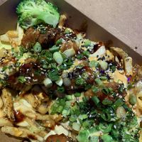 Veg chicken over fries  at Naughty Vegan Panda in Pasadena