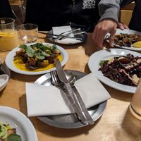 tempeh dish on the left, beetroot salad on the right  at Peaches Gastro Girls in Warsaw