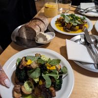 broccolli and baby potatoes dish and super tasty homemade bread with butter-ish spread  at Peaches Gastro Girls in Warsaw