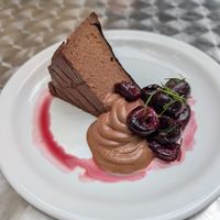 chocolate basque cheesecake with cherries at Peaches Gastro Girls in Warsaw