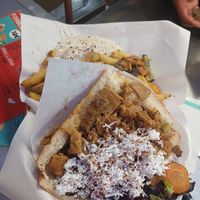 Vegan doner with fries. The white sauce is tahini which was the best I've ever had at Impact Berliner Kebap in Paris