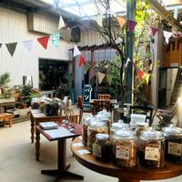 Weekend Market Event where they sell various items in bulk in the garden. Organic Vegetables and drinks also available. at Cafe Slow in Tokyo