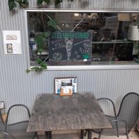 Seating in front of entrance at Cafe Slow in Tokyo