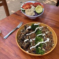 Rainbow Quinoa Salad (back) and Quinoa with blackened tofu with peanut sauce. Generous portion size for both. We also got a burrito to go, carrot cake, and berry blast smoothies    at Cafe Corazon in Troncones