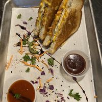 Vegan grilled cheese with the kimchi sauce on the side  at The Grilled Cheese Gallery in St Augustine