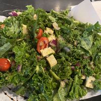 Kale salad - sub out the chicken and bacon for tofu and no feta. Very good!  at The Grilled Cheese Gallery in St Augustine