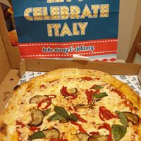 Pizza with vegan cheese at Vivino in Haifa