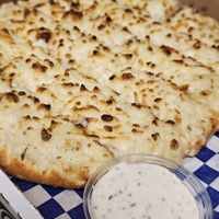 Vegan cheezy breadsticks and vegan ranch at Pizza Twist in Roseville
