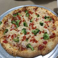 Large vegan cheese pizza with broccoli, onion, red peppers and crushed garlic. at Constantly Pizza in Concord