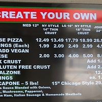 Wall menu, note vegan cheesee  at Constantly Pizza in Concord