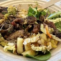 Oyster Mushroom Jerk on greens   at The Hungry Caterpillar in Jacksonville