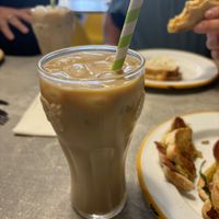 Iced coffee, oat milk, vanilla shot  at Holy Cheesus in Newport
