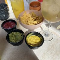 Totopos con guacamole, cheddar vegano y mayonesa de remolacha  at La Chingada in Montevideo