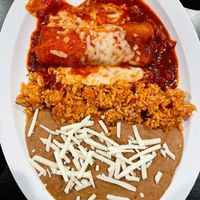 Chickun red sauce enchilada. Rice and beans were delicious✨  at Mamicon's Vegan Mexican Restaurant in Northridge