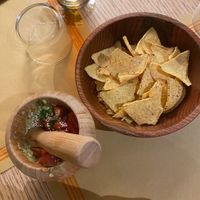 Vegan guacamole with chips  at Handa in Padua