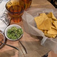 Chips and guac with side of pinto beans at Chiles Mexican Grill in Tokyo