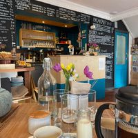 Interior and counter with menu at The Sundial Kitchen in Bristol