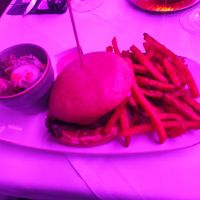 Beyond meat burger with sweet potato fries at Gasthaus Herkenrath Hof in Leverkusen