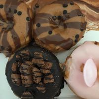 Schokocreme (left), peanutbutter chocolate (right), unfilled (bottom) at Royal Donuts in Leipzig