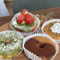 Left to right Matcha crumble, matcha strawberry cream, tieamisu, garlic and cream at O.verte Donuts 오베흐트 도넛 in Seoul