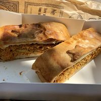 Savory slice with vegetable and seitan(?) filling. Was delicious!!!  at Poppynut in Saint-die-des-vosges