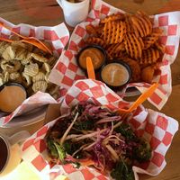 Fried pickles with house made sauce, sweet potatoe fries with cashew based chipotle sauce abs house made ranch, brussel sprouts with kale slaw   at Lily's Snack Bar in Boone
