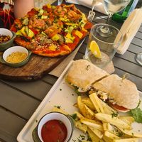 Mother Pizza and Tuna Sandwich at Mother Earth Vegan Restaurant in Tamarindo