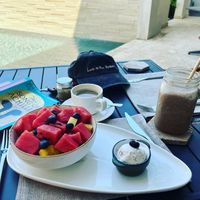 Fruit bowl and scoop of homemade banana ice cream   at Mother Earth Vegan Restaurant in Tamarindo