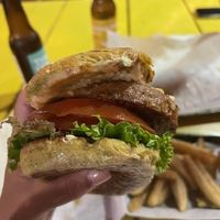 Beyond Meat Burger, look at the size of that! at Mother Earth Vegan Restaurant in Tamarindo