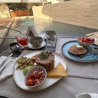 Poolside breakfast (we stayed here also) - breakfast included   at Mother Earth Vegan Restaurant in Tamarindo