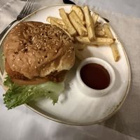 Buffalo white mushroom burger with fries   at Mother Earth Vegan Restaurant in Tamarindo