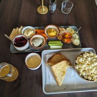 Sampler platter, vegan grilled cheese with popcorn, and mojito kombucha at Cultured South Fermentation Co in Atlanta