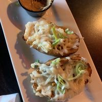 Potato skins (comes with 4, but they were so good I forgot to take a picture sooner)   at Darcy's Pub in Victoria