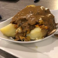 Baked potato with Seitin, veg and pepper sauce  at Harry's Place CIC in Ballynahinch