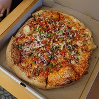 Fully loaded! Potato veggie pizza at Fat Tony's Pizza in Whistler