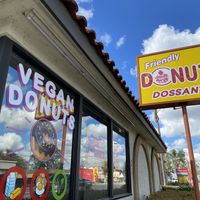 Big sign on the window  at Friendly Doughnuts in Orange