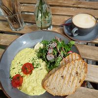 "Scrambled Vegg" (11.9) + Cappuccino (3.8) at Mana Food - Moabit in Berlin